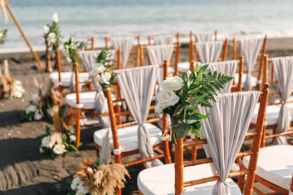 Wedding Set up. Chairs with flowers and greenery on wedding cer